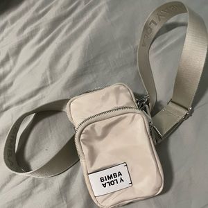 Ecru colored Bimba y Lola wallet bag